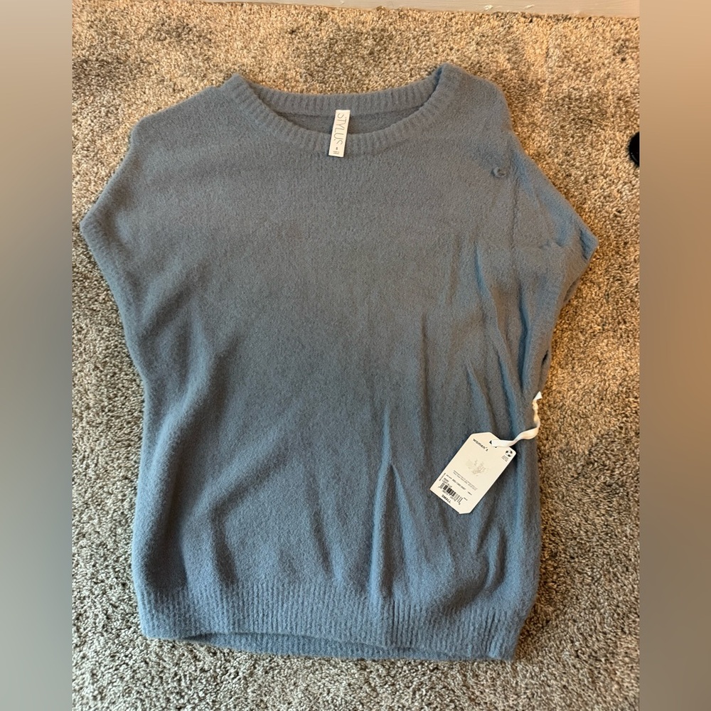 Baby blue short sleeve sweater. Size small